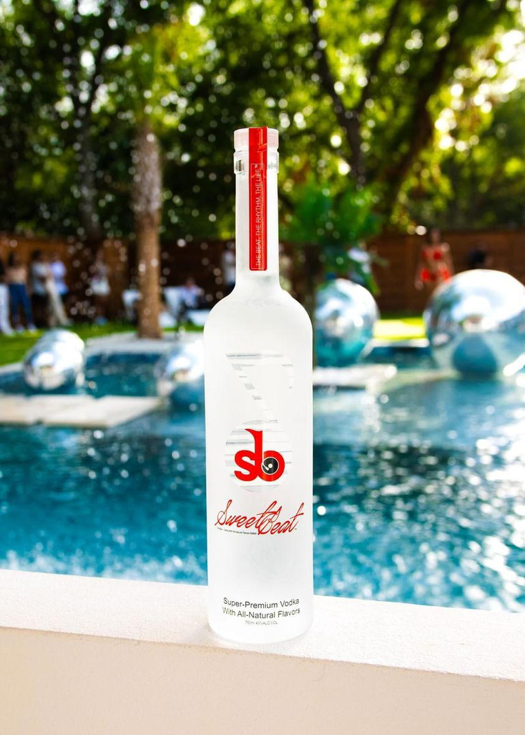 SweetBeat Vodka bottle displayed poolside